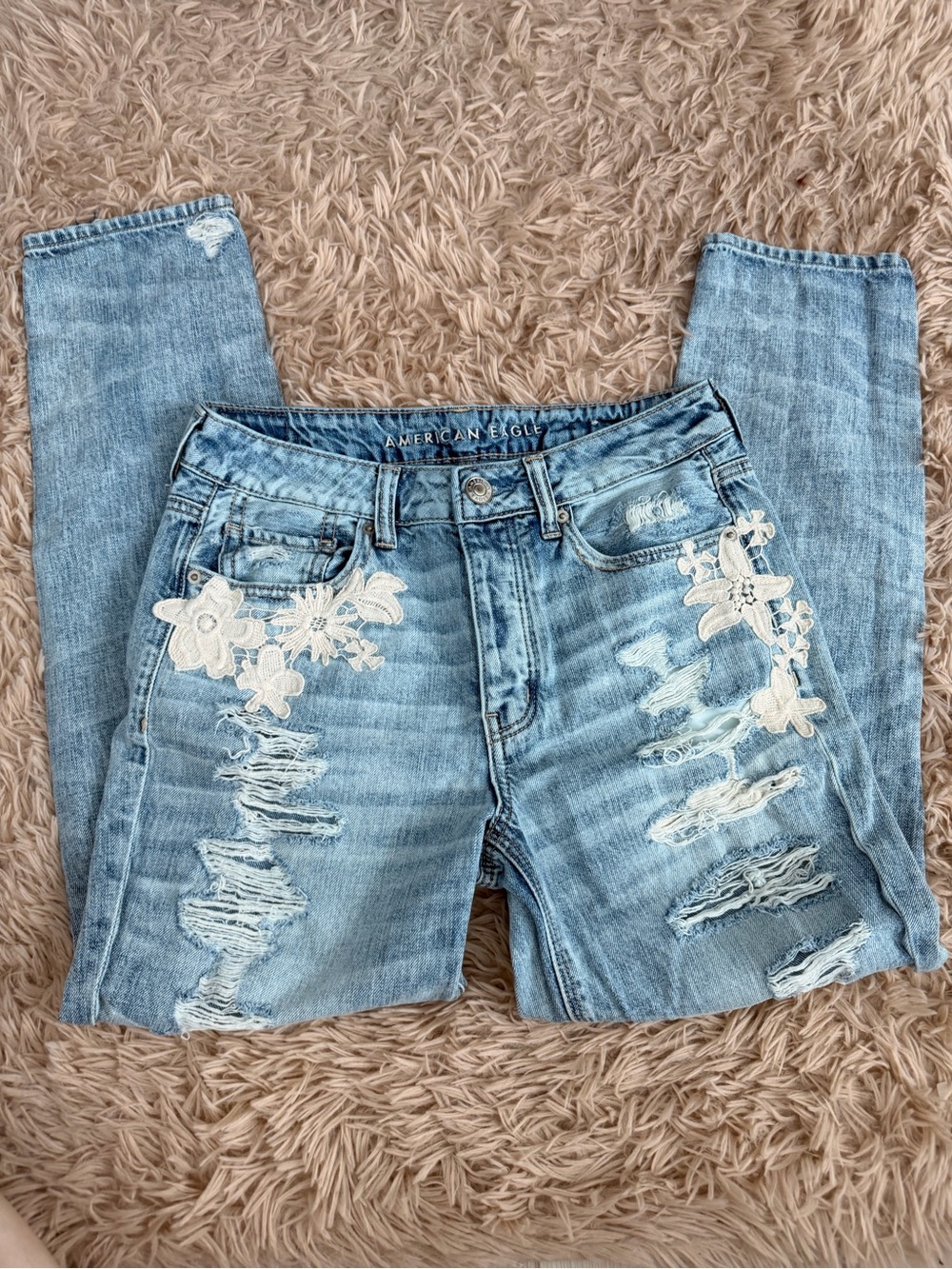 American Eagle Outfitters Light Blue Jeans with White Floral Appliqué